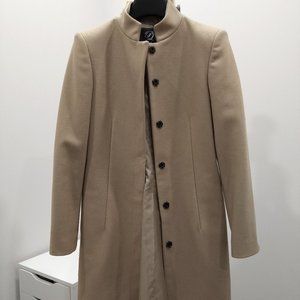 Wool jacket is tan/camel colour